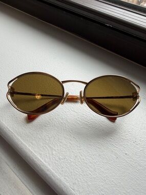 Miu Miu Round Gold Frame Sunglasses with Brown Lenses